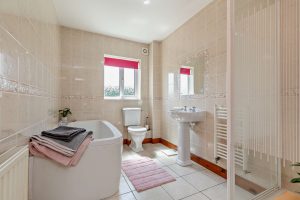 bathroom in a detached dormer bungalow for sale in Penyffordd