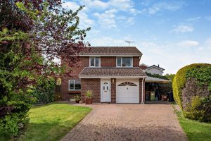 a modern detached house for sale in Tattenhall
