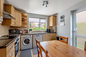 wood effect kitchen in a house for sale in Tattenhall