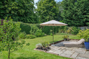 the garden and terrace at a house for sale in Churton