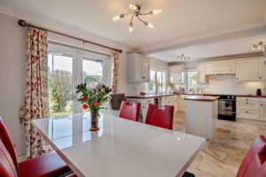 open plan contemporary kitchen dining space in a modern family house for sale in Farndon